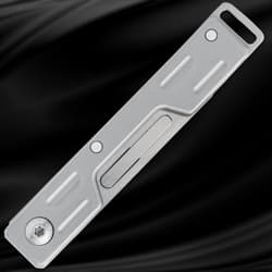 Closed silver folding knife on black background
