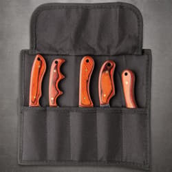 Handles of five knives from the Ridge Runner Knife Set in a black nylon roll pouch