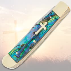 Closed pocket knife with abalone handle and cross inset