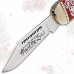 Close-up of knife blade with 'Christ the Lord' etching