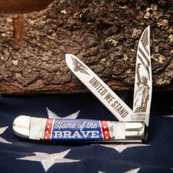 Knife with 'United We Stand' and Statue of Liberty engravings on blades