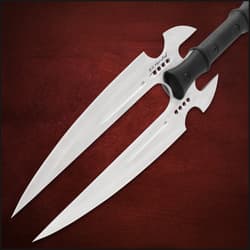 Close-up of twin stainless steel blades with black handle