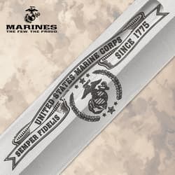 Close-up of USMC engraving on knife blade