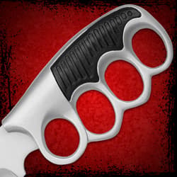 Close-up of knife handle with knuckle grip
