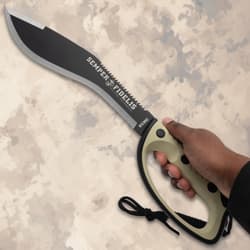 Hand holding USMC kukri knife with serrated blade