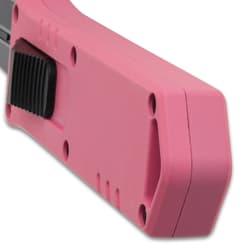 Close-up of pink knife handle with black switch