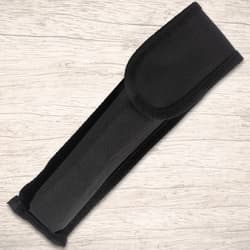 Black fabric sheath for a knife on wood background