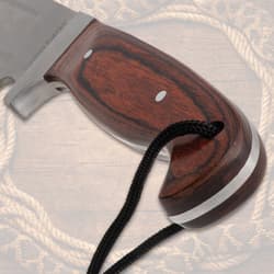 Close-up of knife's polished wooden handle
