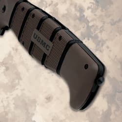 Close-up of USMC knife handle with textured grip