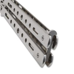 Close-up of closed butterfly knife handle with screws