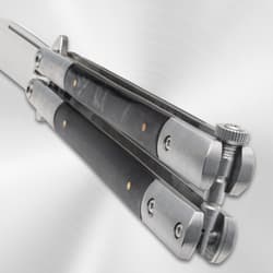 Close-up of butterfly knife handle and locking mechanism