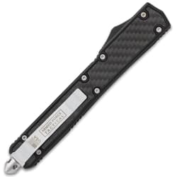 Back view of black tactical knife with pocket clip