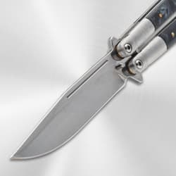 Close-up of butterfly knife blade and pivot area