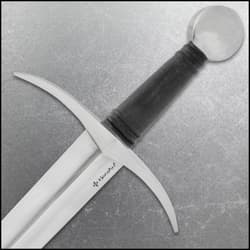 A closeup of the guard and handle of the sword.