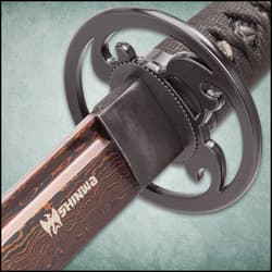 The black lacquered scabbard is shown with black nylon hanging cord and zoomed view of the point of the Damascus steel blade.