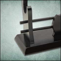 Detailed view of the black hardwood two-tier sword display.