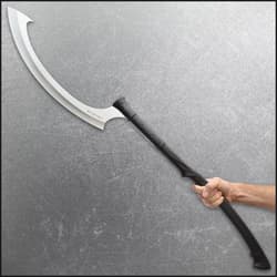 Full view of honshu egyptian sickle shaped sword with a stainless steel blade extended from a edm textured black handle