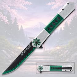 Decorative knife with green and silver handle, mountain background