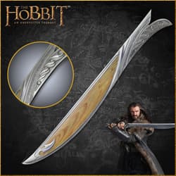 Decorative sword with intricate design and character holding it