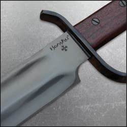 The bowie knife in its sheath