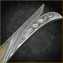 Close-up of sword hilt with runic inscriptions and patterns