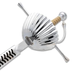 Close-up of a silver rapier's detailed hilt