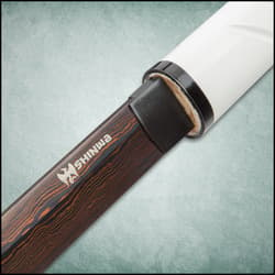 The shirasaya seamlessly blends into the white scabbard adjacent to zoomed view of the black Damascus steel blade tip.