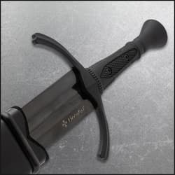 Close-up of sword handle and guard with textured grip