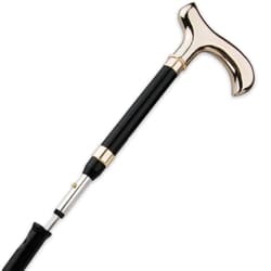 Zoomed view of the gold and black handle with button that releases the blade from the cane shaft.