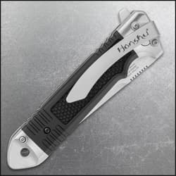 Folded Honshu knife showing pocket clip and handle design