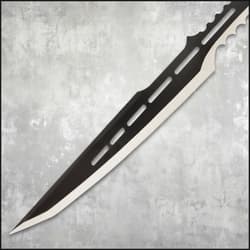 Close-up of sword blade with cutouts