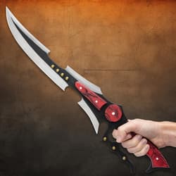 Hand holding a fantasy sword with red accents