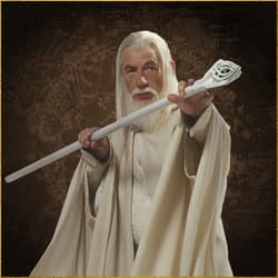 Gandalf in white robes holding a detailed staff