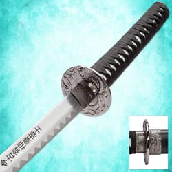 Close-up of katana handle and guard with intricate design