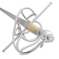 Detailed view of rapier's bone grip and hilt
