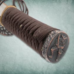 Brown Damascus Tachi pommel close up
