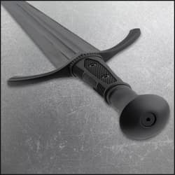 Close-up of sword handle showing textured grip and pommel