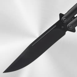 Close-up of black blade of a butterfly knife