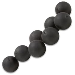 Close-up of black rubber training balls