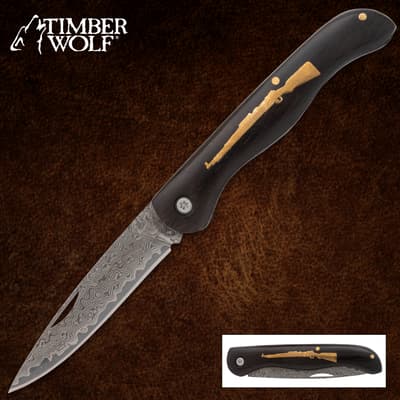 Folding knife with Damascus blade and rifle inlay on handle