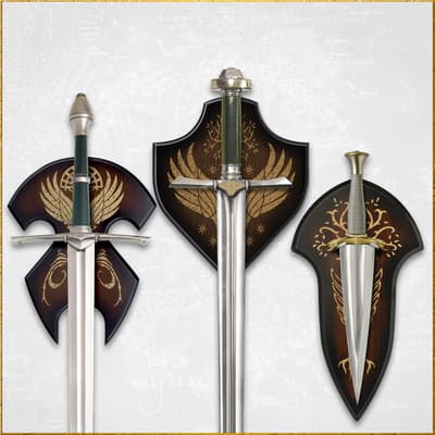Three swords mounted on decorative plaques with elven designs