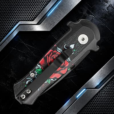 Closed knife with rose design and pocket clip
