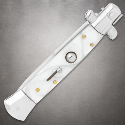 Closed white pearl stiletto knife on gray background