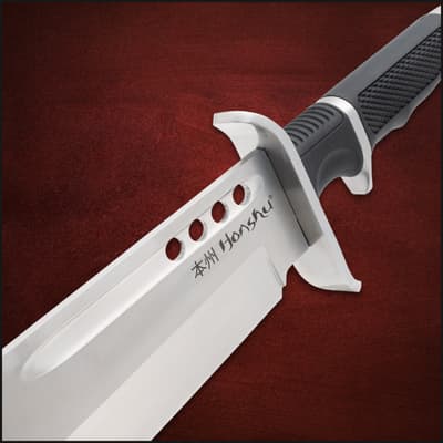 Close-up of knife blade with engraved text