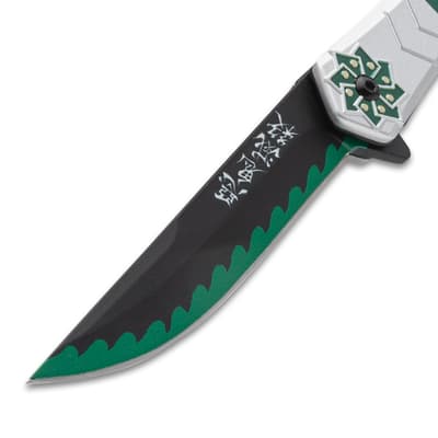 Close-up of knife blade with green edge and symbols