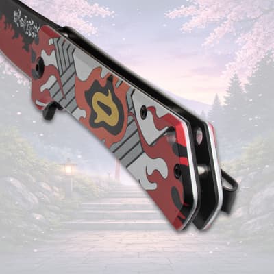 Close-up of knife handle with flame pattern, scenic backdrop