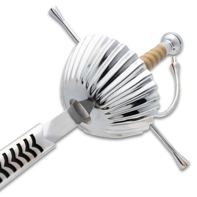 Close-up of a silver rapier's detailed hilt