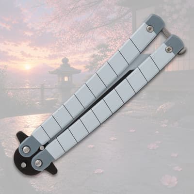 Closed butterfly knife with scenic background