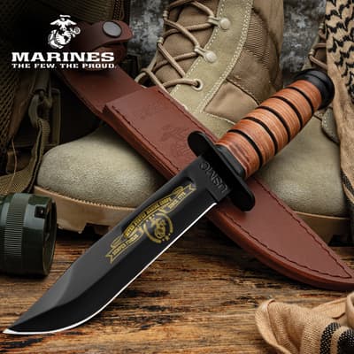 USMC knife with leather sheath and military boots