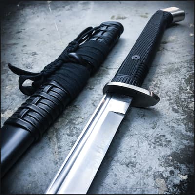 Close-up of katana and black wrapped sheath